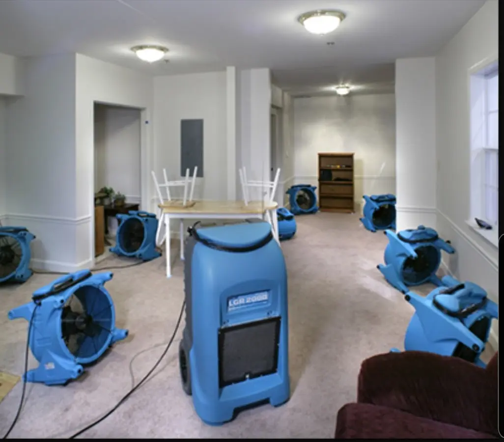 Air movers and dehumidifier setup for Water Damage Restoration in Ada